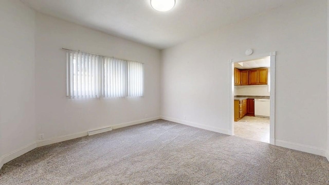 418 S Main St, Rankin, IL 60960 - unfurnished room featuring light colored carpet and baseboards
