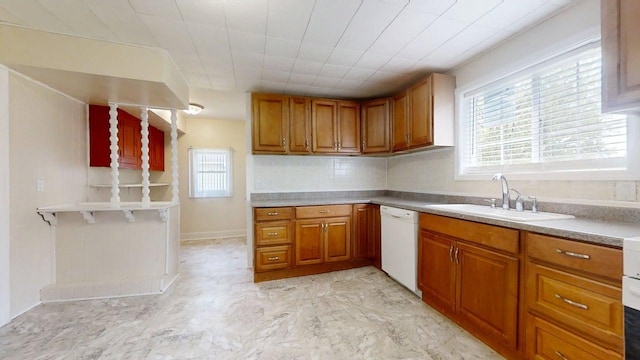 418 S Main St, Rankin, IL 60960 - kitchen featuring dishwasher and brown cabinets