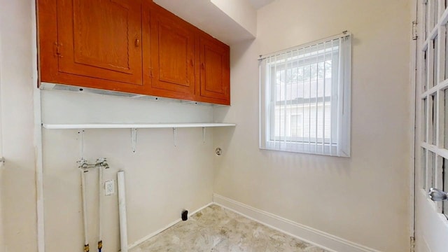 418 S Main St, Rankin, IL 60960 - laundry area featuring cabinet space and washer hookup