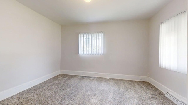 418 S Main St, Rankin, IL 60960 - empty room featuring carpet floors