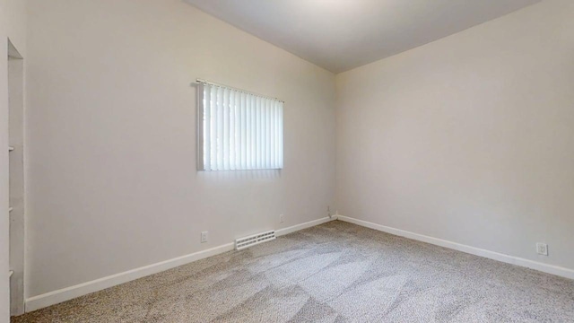 418 S Main St, Rankin, IL 60960 - unfurnished room featuring carpet floors and baseboards