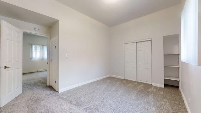 418 S Main St, Rankin, IL 60960 - unfurnished bedroom with carpet flooring and a closet