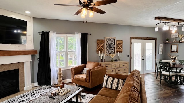 2703 Westbrook Dr, Bloomington, IL 61705 - living area with a ceiling fan, wood finished floors, and a fireplace