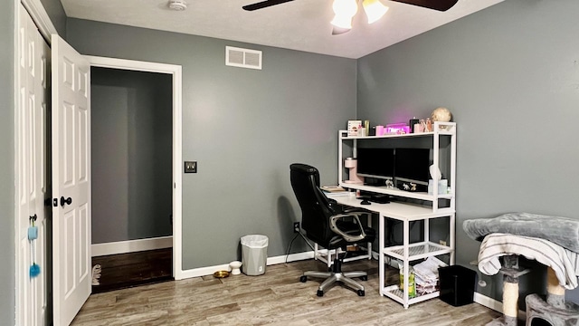 2703 Westbrook Dr, Bloomington, IL 61705 - office with a ceiling fan, wood finished floors, and baseboards