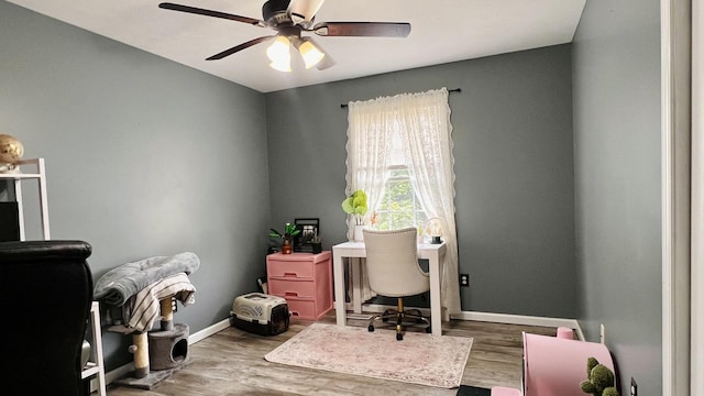 2703 Westbrook Dr, Bloomington, IL 61705 - office with ceiling fan, wood finished floors, and baseboards