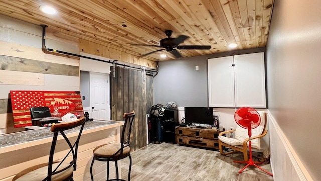 2703 Westbrook Dr, Bloomington, IL 61705 - office space with a barn door, wood ceiling, light wood finished floors, a ceiling fan, and recessed lighting