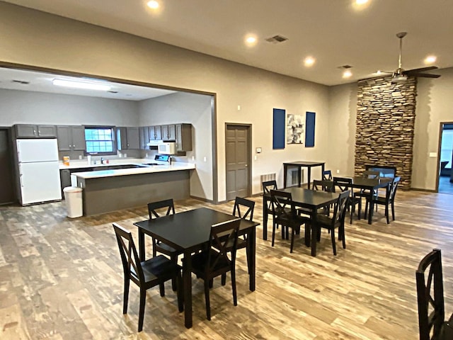 2703 Westbrook Dr, Bloomington, IL 61705 - dining space featuring light wood finished floors, a ceiling fan, and recessed lighting