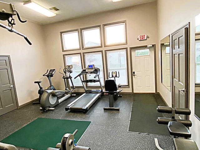 2703 Westbrook Dr, Bloomington, IL 61705 - workout area featuring baseboards