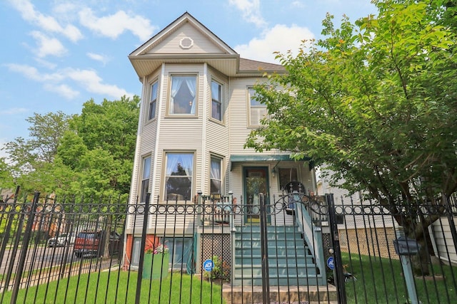 2559 N Saint Louis Ave, Chicago, IL 60647 - victorian-style house with a fenced front yard and a gate