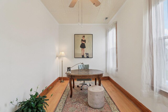 2559 N Saint Louis Ave, Chicago, IL 60647 - office space featuring light wood-type flooring, ornamental molding, and a ceiling fan