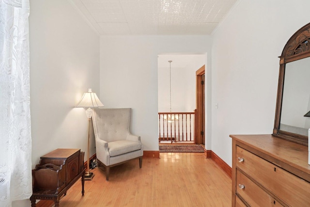 2559 N Saint Louis Ave, Chicago, IL 60647 - living area with light wood finished floors and crown molding