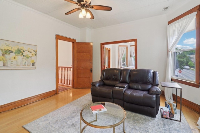 2559 N Saint Louis Ave, Chicago, IL 60647 - living room featuring wood finished floors, ornamental molding, and ceiling fan