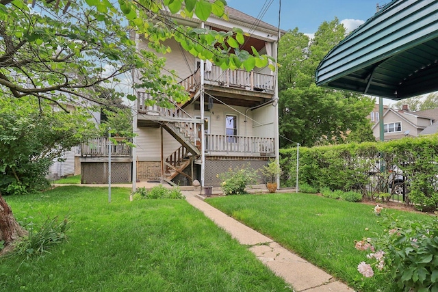 2559 N Saint Louis Ave, Chicago, IL 60647 - view of grassy yard featuring stairway and a deck