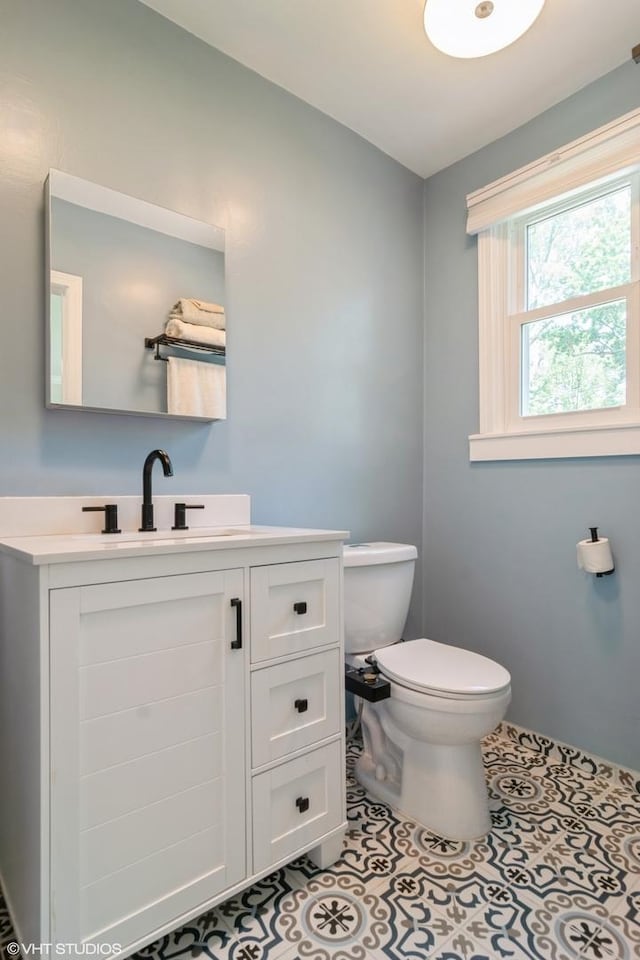 2617 Thayer St, Evanston, IL 60201 - bathroom with vanity and tile patterned floors