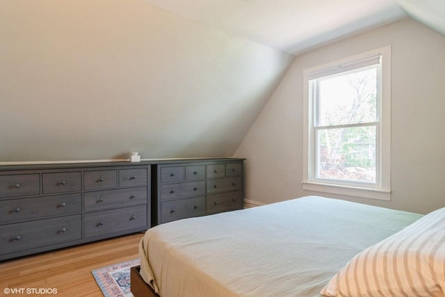 2617 Thayer St, Evanston, IL 60201 - bedroom with light wood-type flooring and lofted ceiling