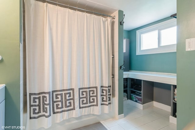 2617 Thayer St, Evanston, IL 60201 - full bath featuring shower / bathtub combination with curtain, tile patterned flooring, and vanity