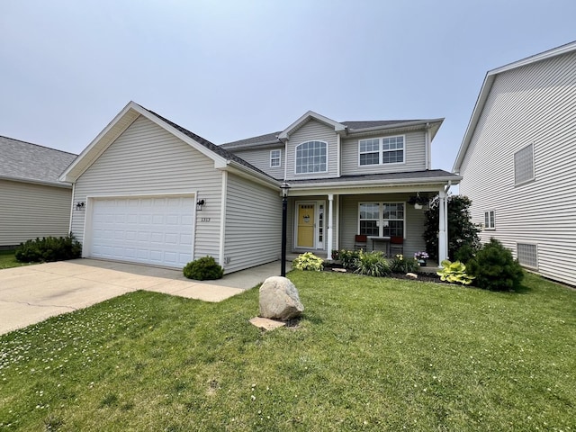 1313 W Ridge Ln, Champaign, IL 61822 - traditional-style home with a porch, a garage, concrete driveway, and a front lawn