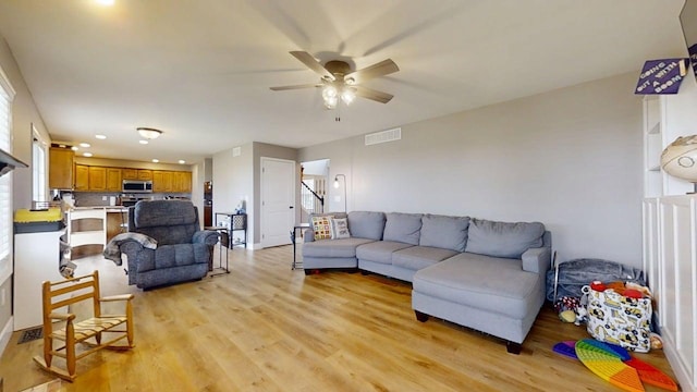 1313 W Ridge Ln, Champaign, IL 61822 - living room featuring a ceiling fan, light wood finished floors, and recessed lighting