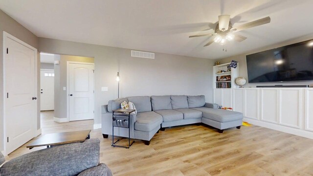 1313 W Ridge Ln, Champaign, IL 61822 - living room with ceiling fan and light wood finished floors
