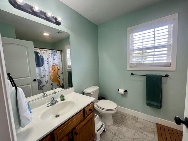 1313 W Ridge Ln, Champaign, IL 61822 - full bathroom featuring vanity and a shower with curtain