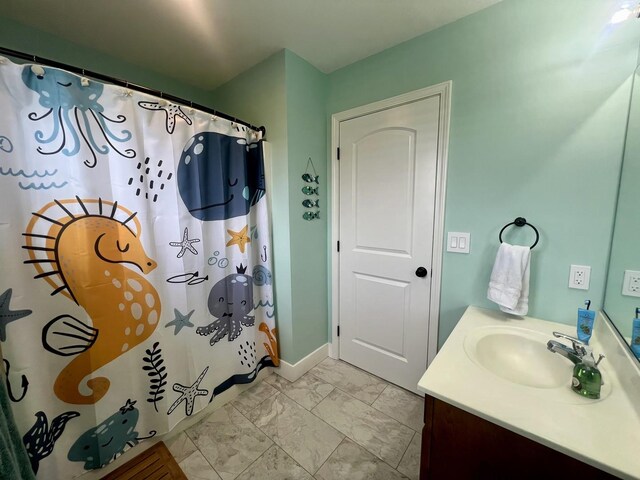 1313 W Ridge Ln, Champaign, IL 61822 - bathroom featuring marble finish floors, vanity, and curtained shower