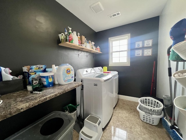 1313 W Ridge Ln, Champaign, IL 61822 - washroom with washing machine and clothes dryer and light tile patterned floors