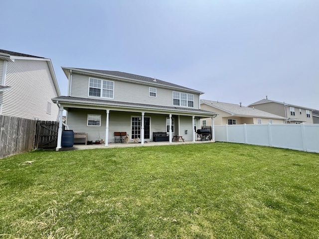 1313 W Ridge Ln, Champaign, IL 61822 - back of property with a patio area and a fenced backyard