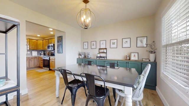 1313 W Ridge Ln, Champaign, IL 61822 - dining room featuring light wood-type flooring, a chandelier, and recessed lighting