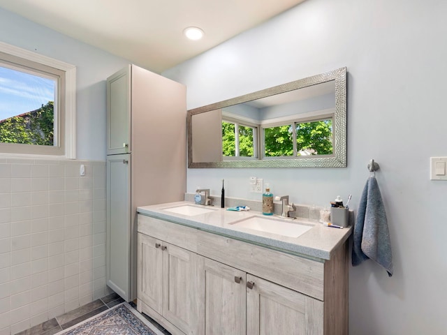 225 S Gladstone Ave, Aurora, IL 60506 - full bathroom with double vanity and tile walls