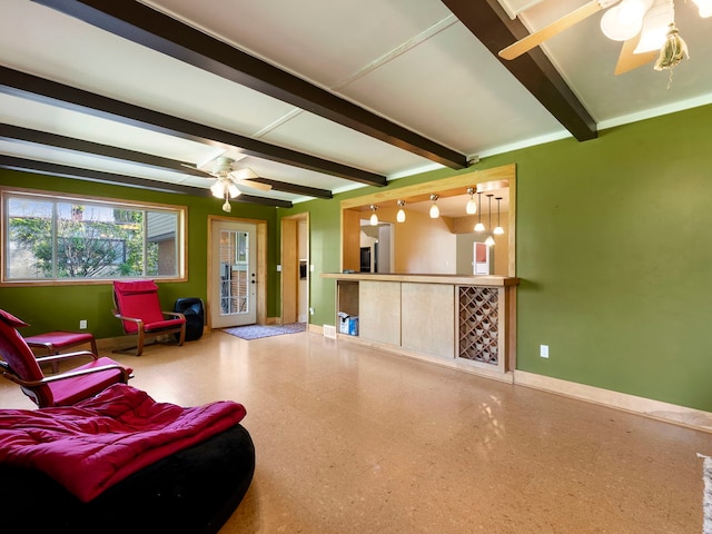 225 S Gladstone Ave, Aurora, IL 60506 - living room featuring ceiling fan, baseboards, beamed ceiling, and a dry bar