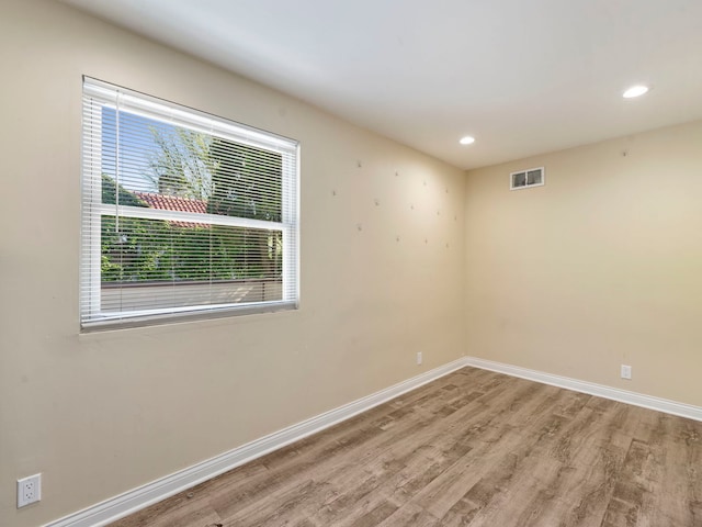 225 S Gladstone Ave, Aurora, IL 60506 - spare room featuring wood finished floors, baseboards, and recessed lighting