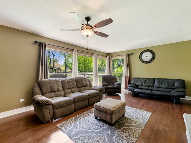 225 S Gladstone Ave, Aurora, IL 60506 - living room featuring ceiling fan, wood finished floors, and baseboards