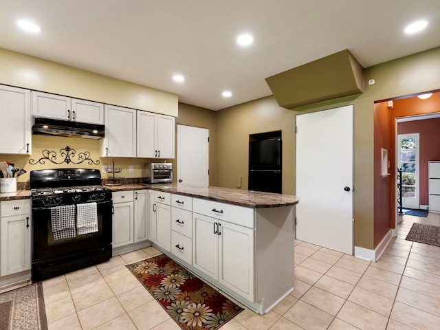225 S Gladstone Ave, Aurora, IL 60506 - kitchen with black appliances, under cabinet range hood, a peninsula, light tile patterned floors, and white cabinetry