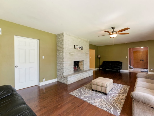 225 S Gladstone Ave, Aurora, IL 60506 - living area with wood finished floors, a ceiling fan, baseboards, and a fireplace