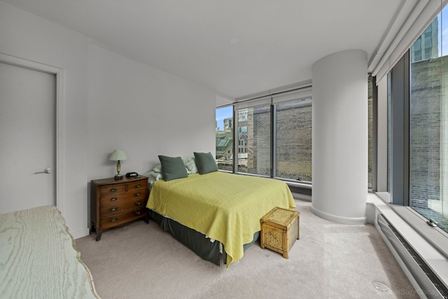 60 E Monroe St Unit 1604, Chicago, IL 60603 - bedroom featuring a baseboard heating unit, multiple windows, and carpet floors