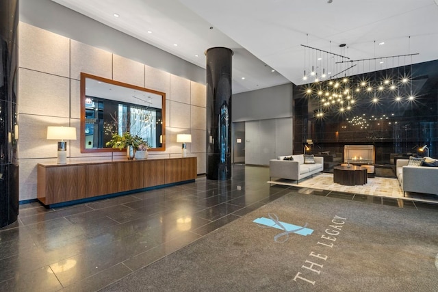 60 E Monroe St Unit 1604, Chicago, IL 60603 - reception with a high ceiling, recessed lighting, and tile walls