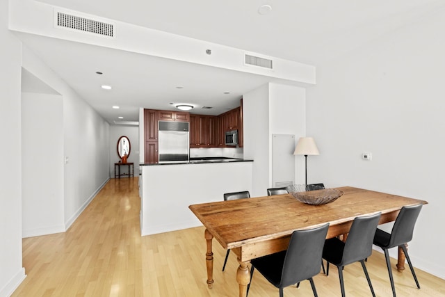 60 E Monroe St Unit 1604, Chicago, IL 60603 - dining area with light wood-type flooring, baseboards, and recessed lighting