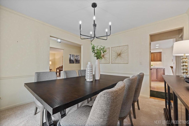 554 Carriage Hill Rd, Naperville, IL 60565 - dining space featuring a chandelier, crown molding, light carpet, and baseboards