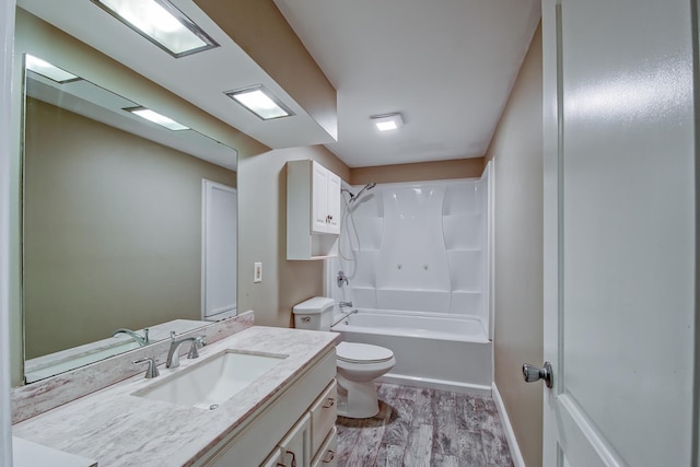 506 Sunrise Dr, Mchenry, IL 60051 - bathroom featuring vanity, toilet, wood finished floors, bathing tub / shower combination, and baseboards