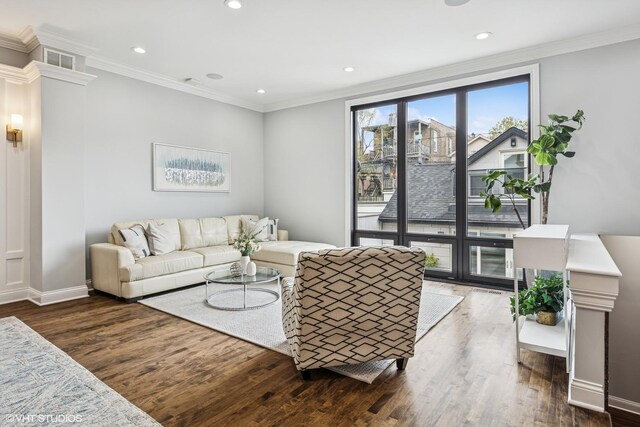 1717 W Huron St, Chicago, IL 60622 - living room with wood finished floors, recessed lighting, baseboards, and ornamental molding