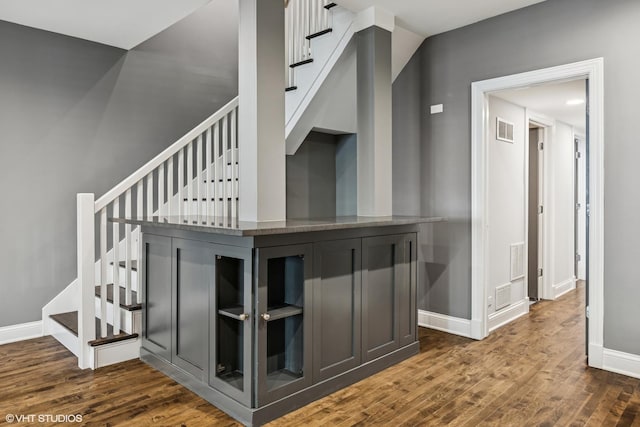 1717 W Huron St, Chicago, IL 60622 - stairway featuring wood finished floors and baseboards