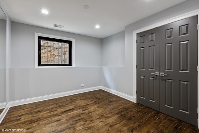 1717 W Huron St, Chicago, IL 60622 - unfurnished room with dark wood-style floors, baseboards, and recessed lighting