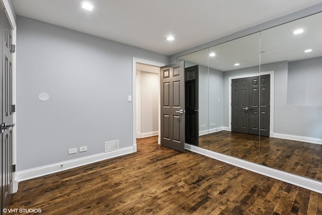 1717 W Huron St, Chicago, IL 60622 - unfurnished bedroom featuring wood finished floors, baseboards, recessed lighting, and a closet