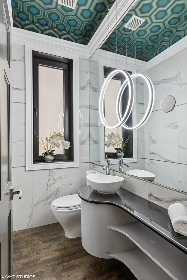1717 W Huron St, Chicago, IL 60622 - bathroom featuring tile walls, crown molding, vanity, an ornate ceiling, and toilet