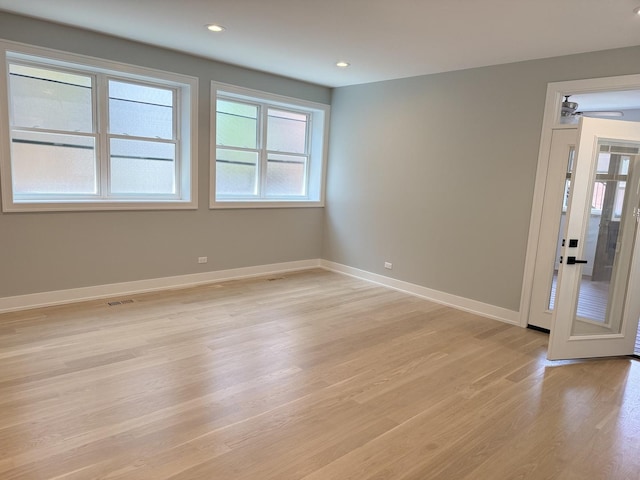 2714 W Cortez St Unit 1, Chicago, IL 60622 - unfurnished room featuring light wood finished floors, baseboards, and recessed lighting