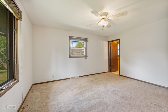 337 George St, Sycamore, IL 60178 - spare room with carpet floors and a ceiling fan