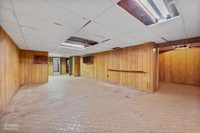 337 George St, Sycamore, IL 60178 - finished basement with light floors, wood walls, and a drop ceiling