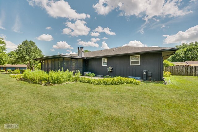 337 George St, Sycamore, IL 60178 - back of house featuring a sunroom