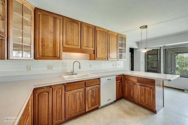 337 George St, Sycamore, IL 60178 - kitchen featuring white dishwasher and brown cabinets