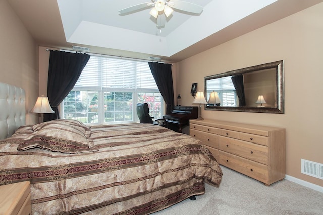 11646 Evergreen Ln, Huntley, IL 60142 - bedroom with carpet flooring, a raised ceiling, and ceiling fan